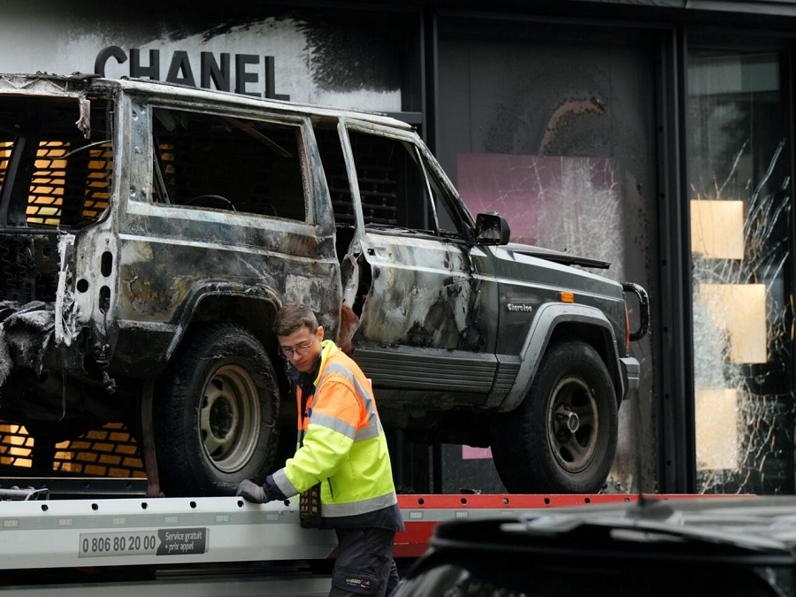 Millions stolen from Chanel in Paris as robbers ram SUV into shop ...